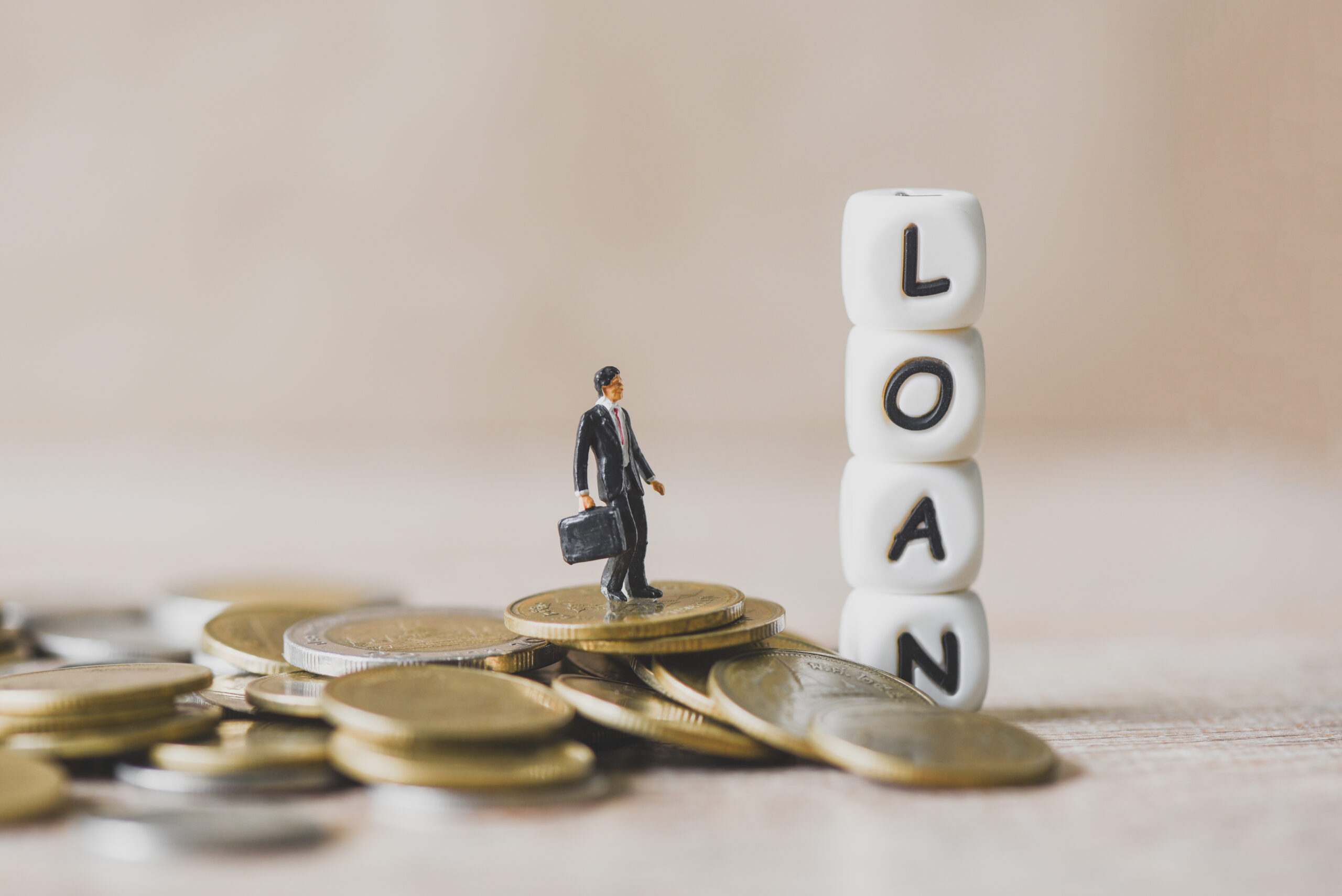 Financial loan concept,  businessmen stand on money coin, loan money. loan officer